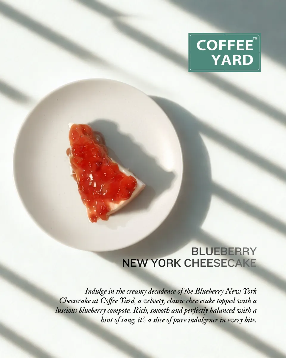 A slice of blueberry New York cheesecake, labelled for a menu