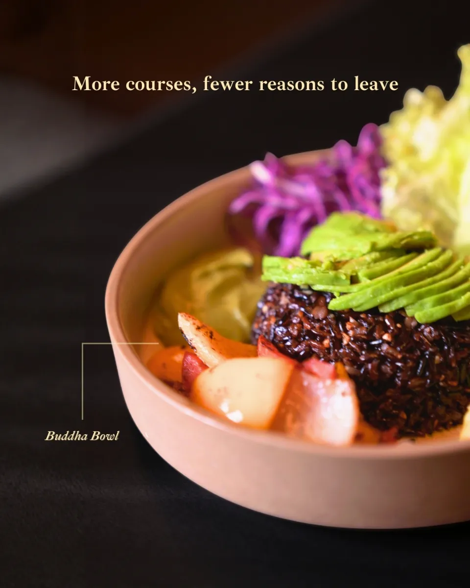 A buddha bowl with black rice and avocado, labelled for a menu