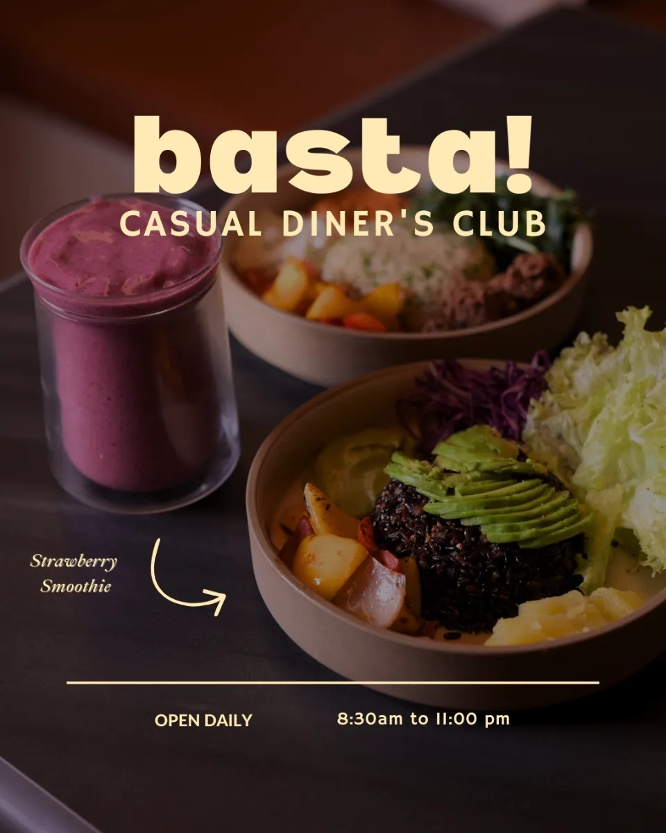 A strawberry smoothie beside two bowls, laid out for a diner menu