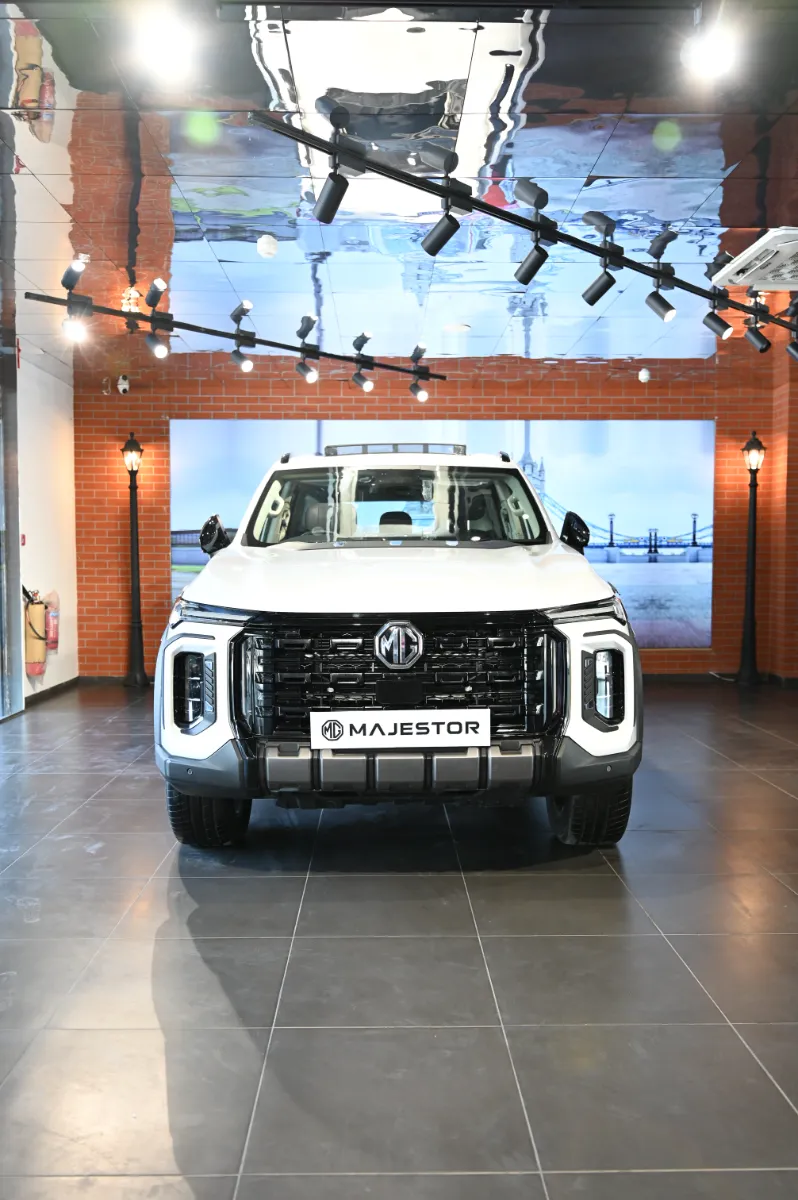 An MG Majestor facing the camera in a showroom